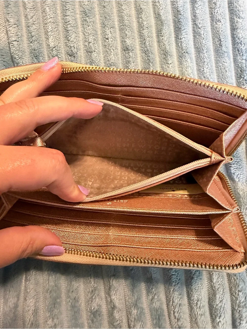 kate spade metallic rose gold zip-around wallet